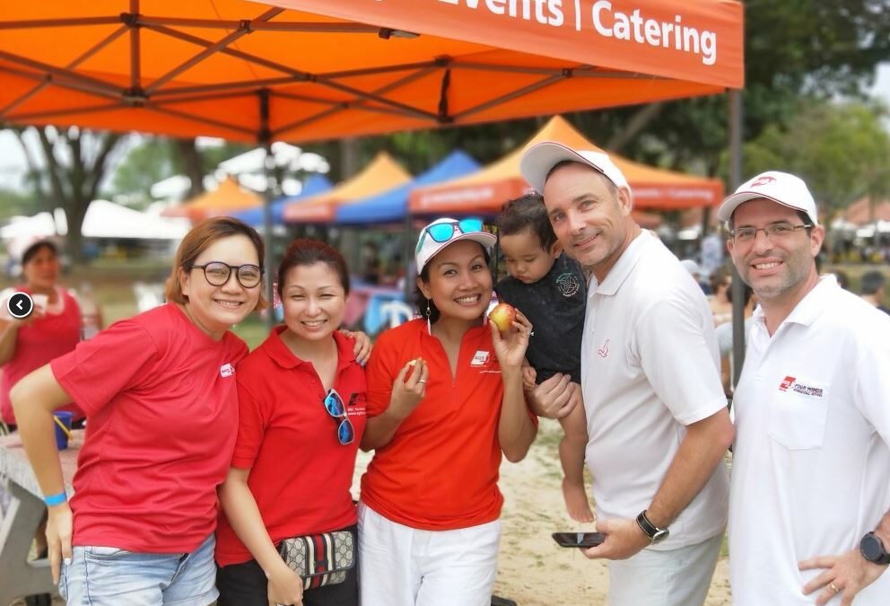 AGS Singapore team members at Pétanque tournament.