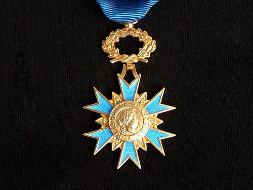 Annie Majos decorated as Knight of the National Order of Merit